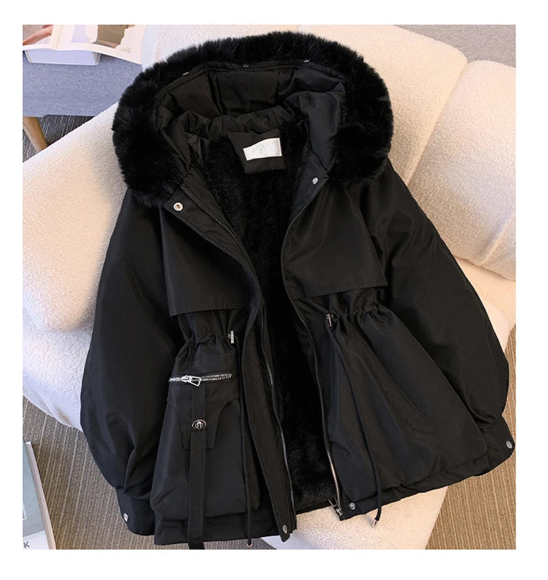 Elegant women's coat with faux fur collar