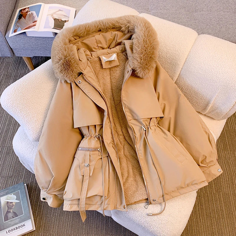 Elegant women's coat with faux fur collar