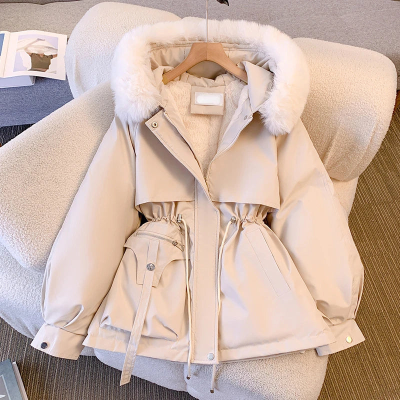 Elegant women's coat with faux fur collar