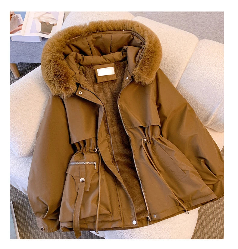 Elegant women's coat with faux fur collar