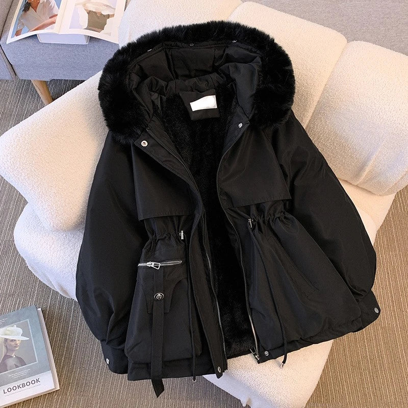 Elegant women's coat with faux fur collar