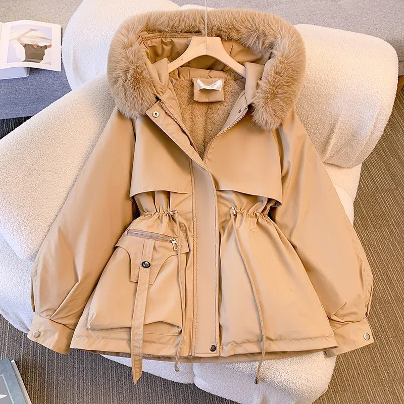 Elegant women's coat with faux fur collar