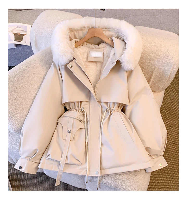 Elegant women's coat with faux fur collar