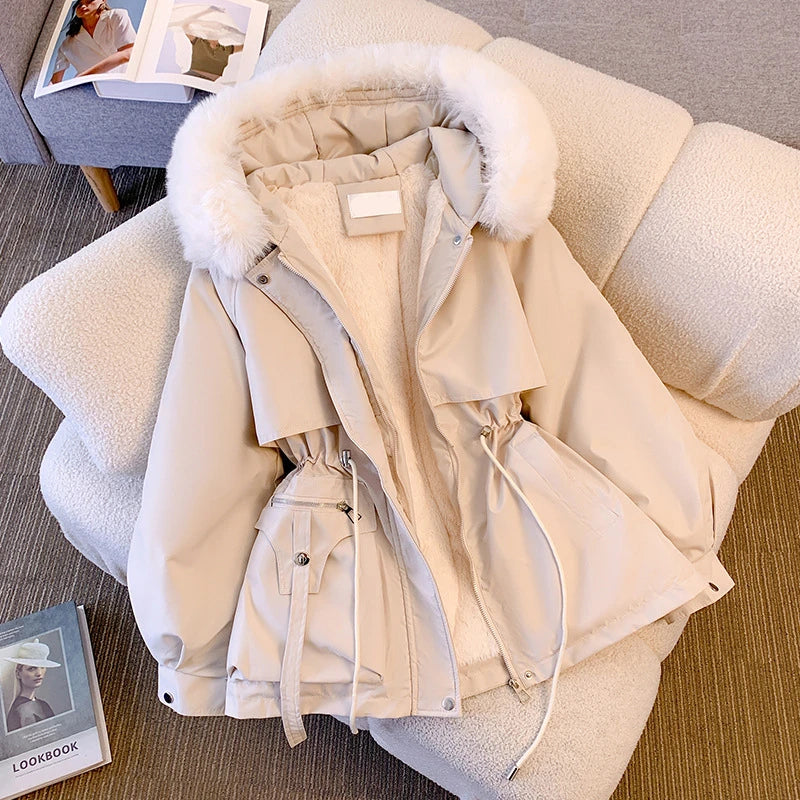Elegant women's coat with faux fur collar