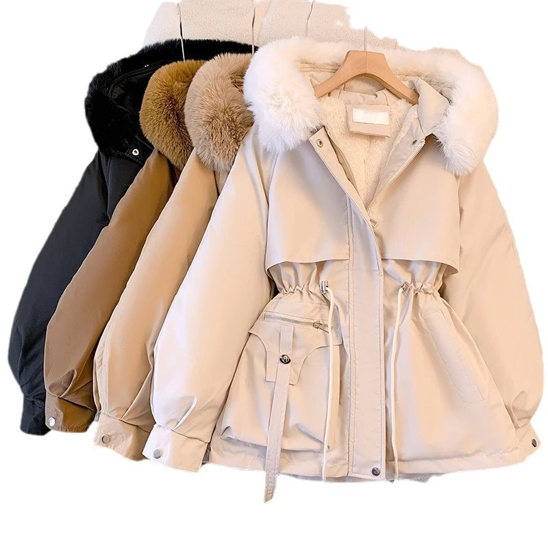 Elegant women's coat with faux fur collar