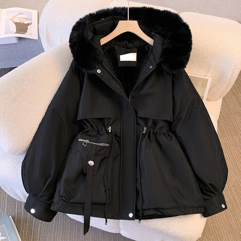 Elegant women's coat with faux fur collar