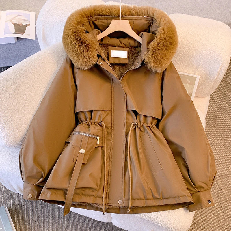Elegant women's coat with faux fur collar